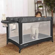 Multi-functional baby play yard with bassinet and organizer