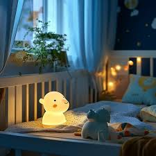 Gender-neutral baby nursery with crib and coordinated bedding set