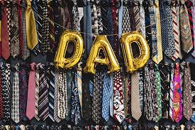 Backyard party for expectant dad – modern daddy baby shower celebration.
