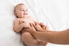 Stomach massage for baby to relieve colic discomfort.