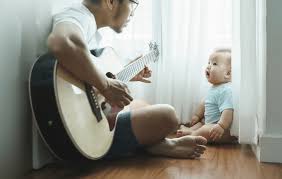 Parent calming baby with live music
