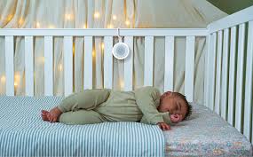 White noise machine on a nursery nightstand
